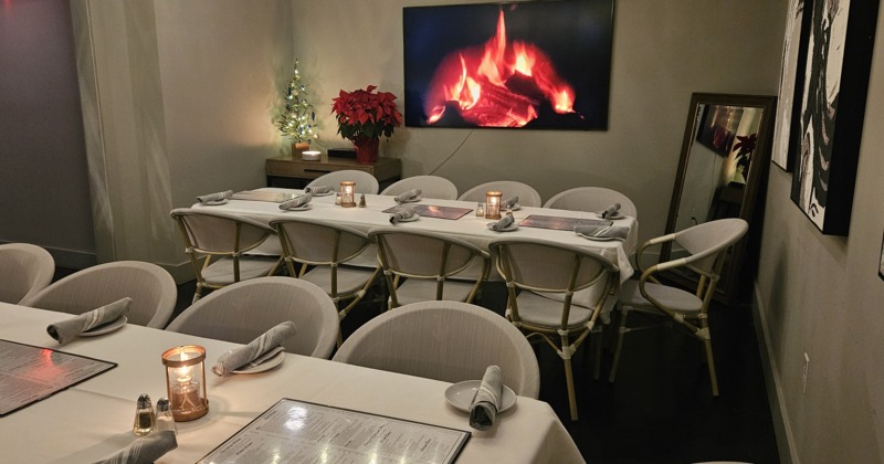 Interior, dining area, guests chatting and enjoying their food and drinks