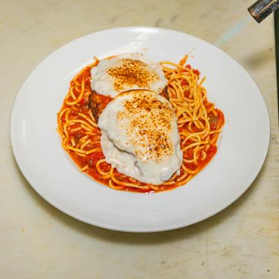 Served pasta in the plate.