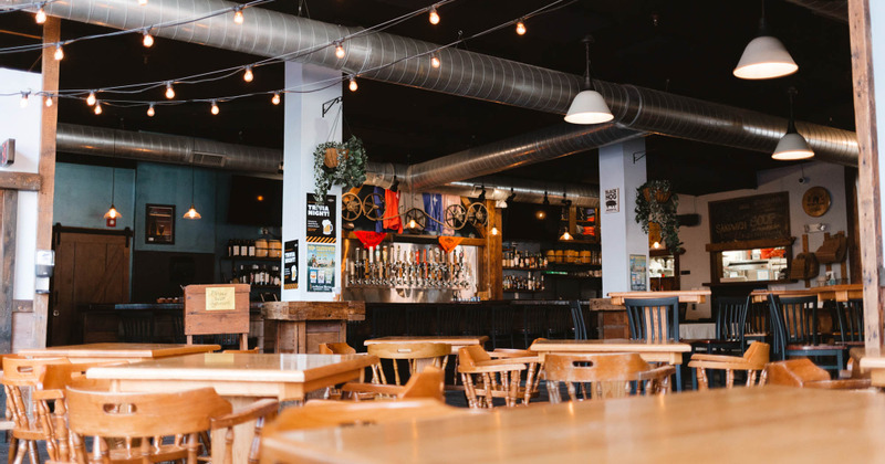 Interior, dining area and the bar in the back