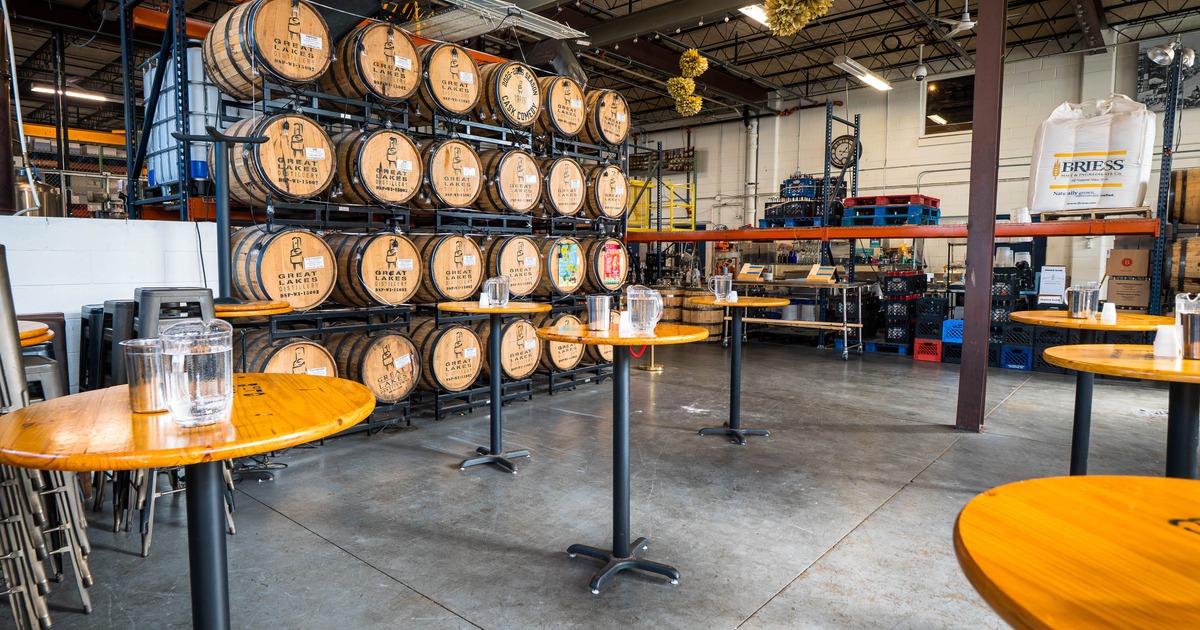 Interior, round tables with barrels in the back