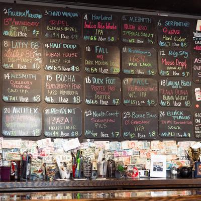 Chalkboard bar menu on a wall.