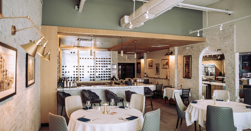 Interior, set tables and chairs ready for guests