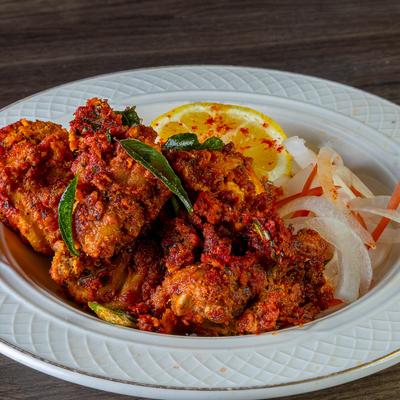 Spiced chicken with onions and lemon.