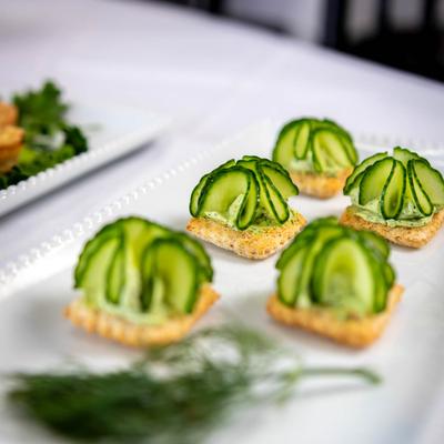Served lucky leaf cucumber sandwiches.