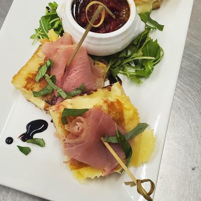 Brie crostini and prosciutto appetizers