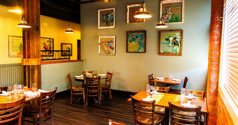 Restaurant interior, dining area with set tables