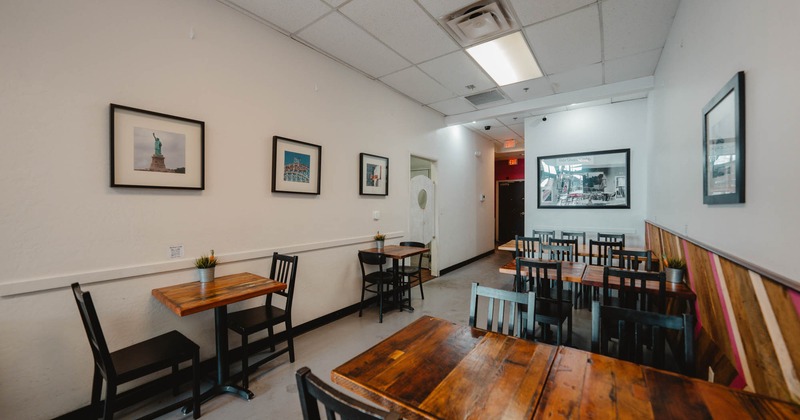 Dining area decorated with pictures on the walls