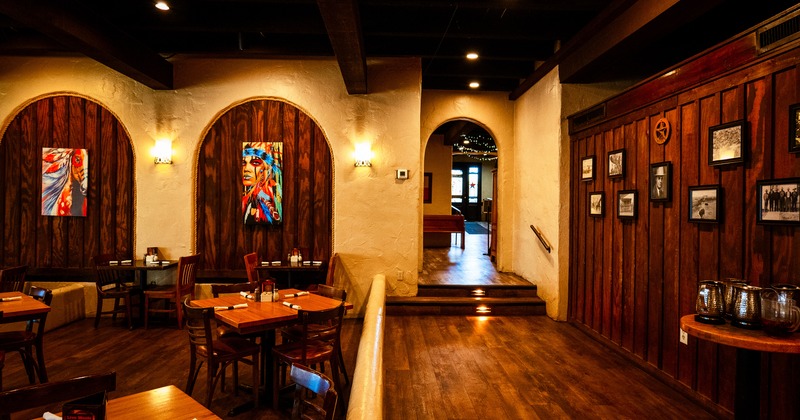 Warm and cozy interior dining area with set tables