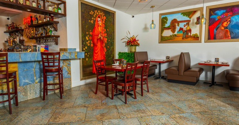 Interior, seating area, Mexico inspired paintings, table for four, seating booths, bar