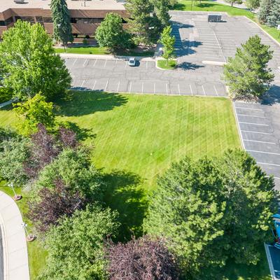 Aerial view on lawn and parking