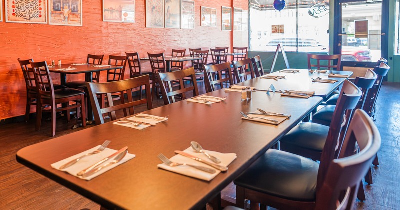 Interior, tables and chairs ready for guests