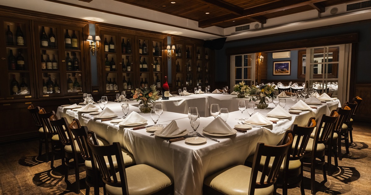 Elegant private dining room set up for a formal event or dinner