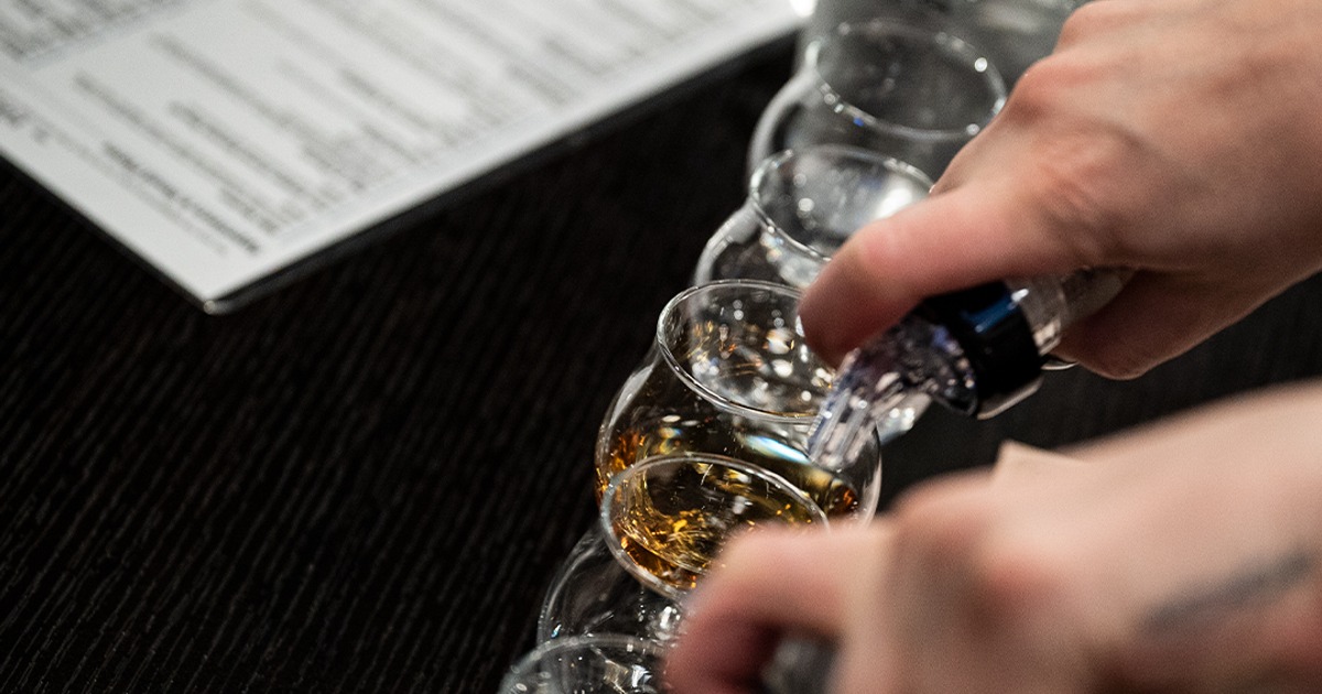 Bartender pouring drinks