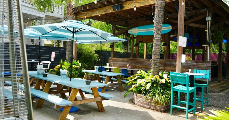 Outdoor seating area with a covered patio in the back