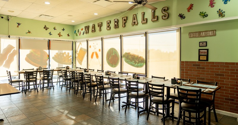 Spacious interior dining area with tables ready for guests