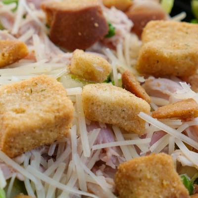 A closeup on the Caesar salad.