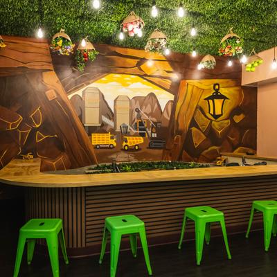 The bar and a large mural on the wall behind.