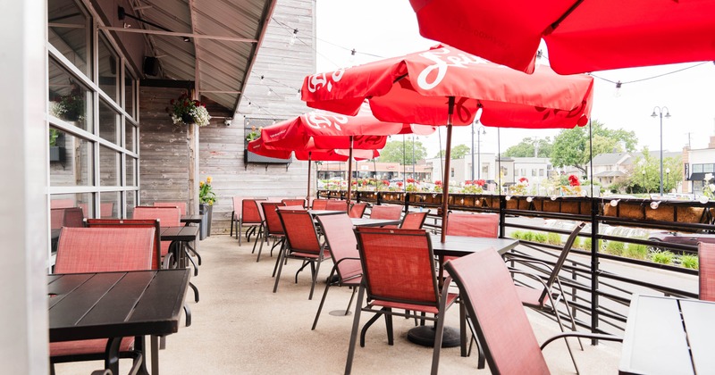 Outside, patio, tables, chairs, parasols