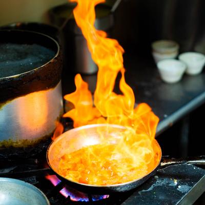 Flaming pan.