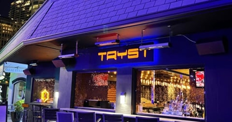 Tryst Gastro Lounge's outside bar at night