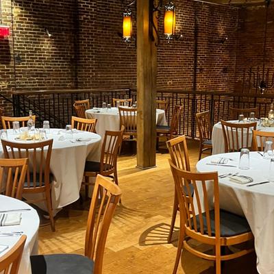 Dining area, round tables ready for guests.