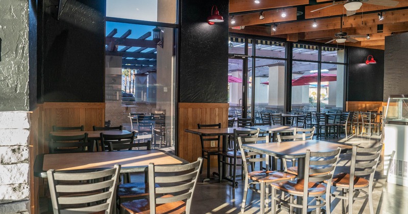 Interior, tables with chairs ready for guests