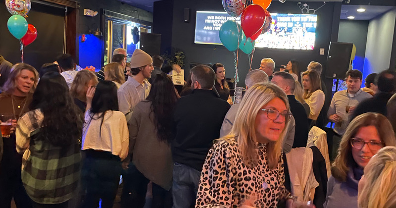 Interior, a crowd of guests