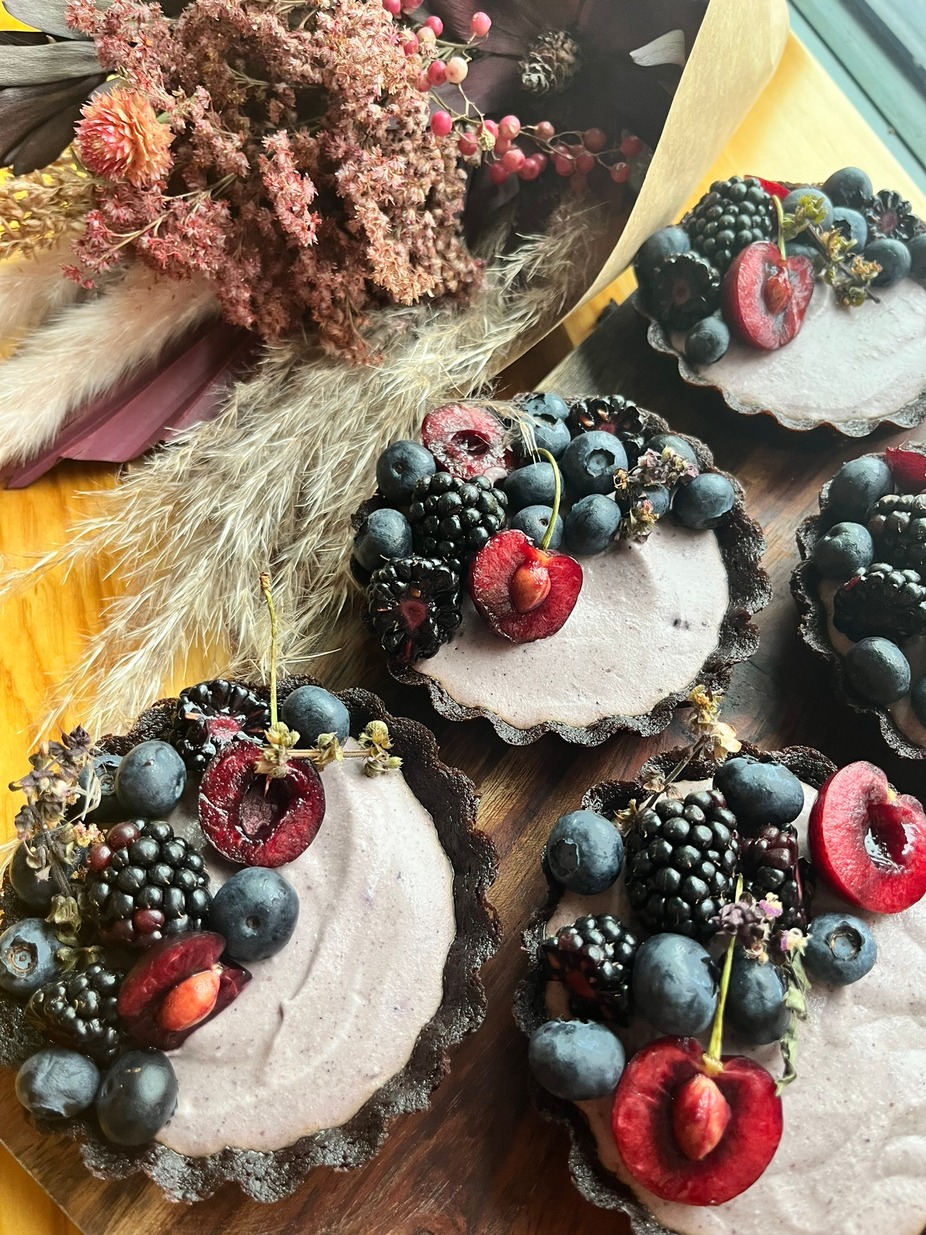 Blackberry mousse fills a chocolate crust and is beautifully topped with seaonal fruits for a wonderful ombre dessert.  Available every day while supplies last.