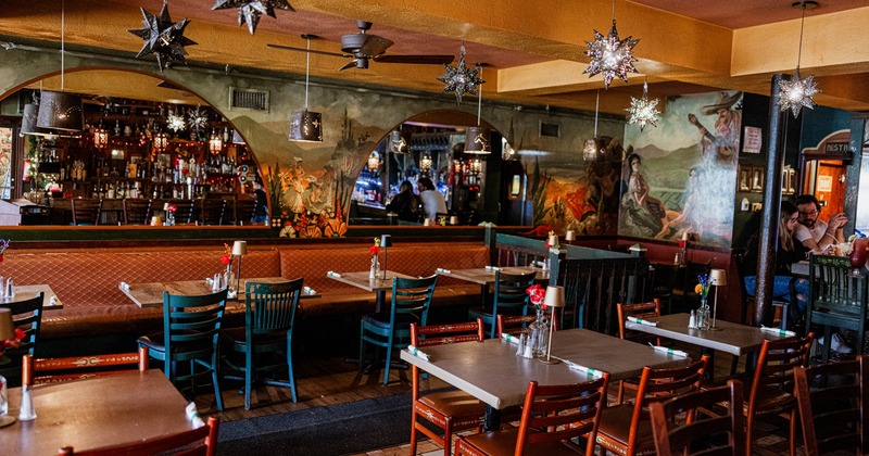 Interior, tables and chairs in seating area
