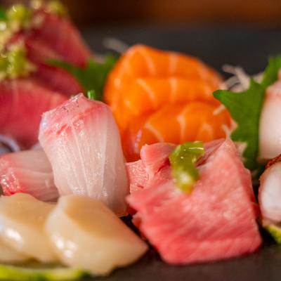 Close-up view of colorful sashimi pieces.