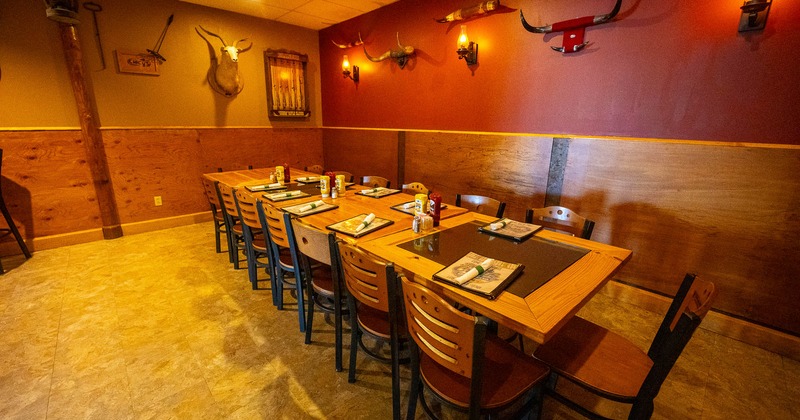 Interior, wooden table with chairs and tableware