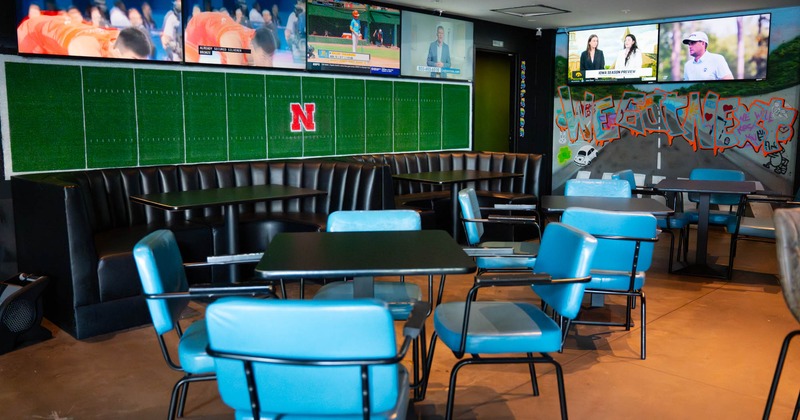 Interior, seating booths, tables and blue chairs