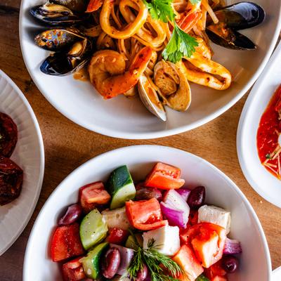 Plates with various meals.