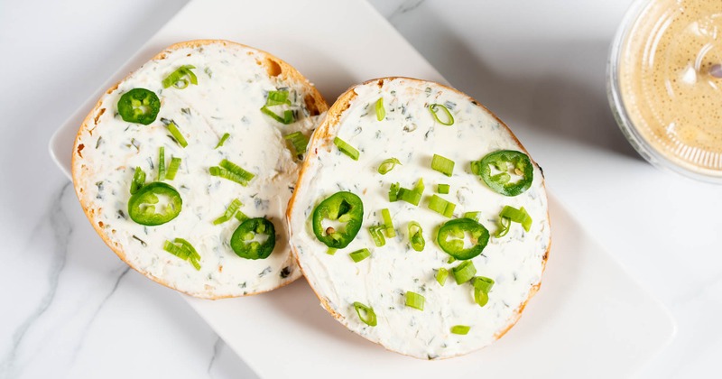 Chives Cream Cheese on a Jalapeno Bagel