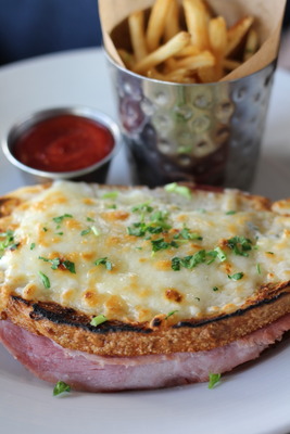 Croque monsieur, hot ham and cheese sandwich.