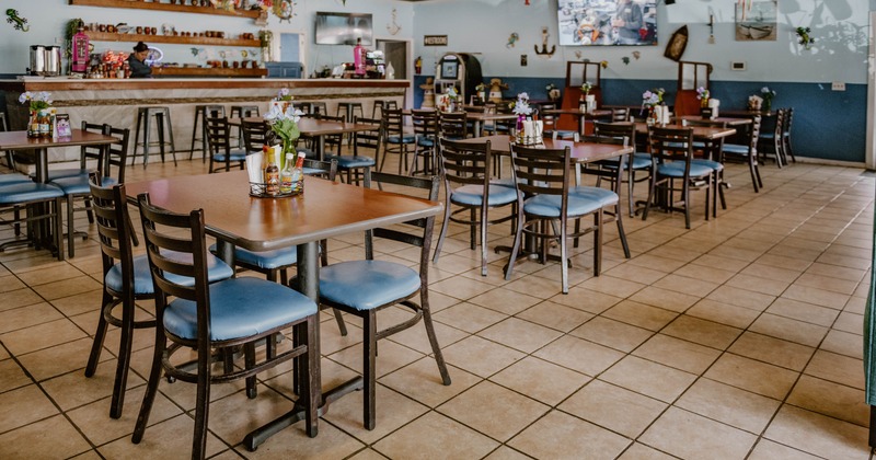 Interior, seating area with tables and chairs