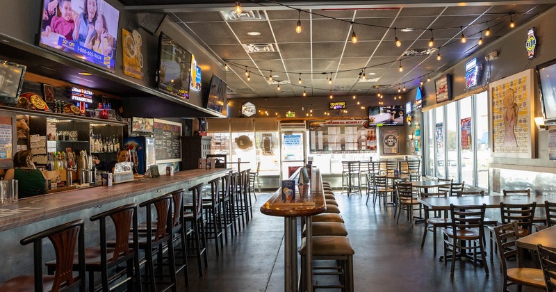 Interior, bar area and dining tables