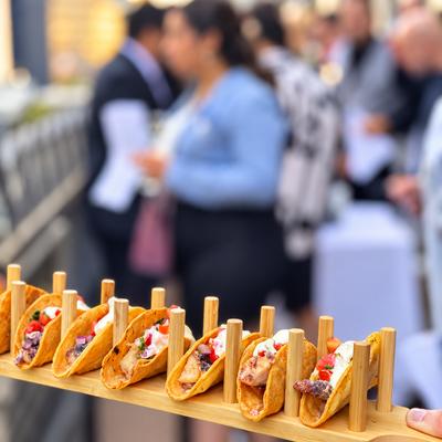 Mini tacos on a serving tray.