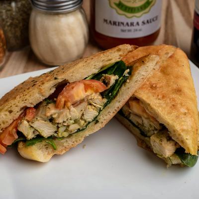 Grilled chicken sandwich, with tomatoes, and spinach.