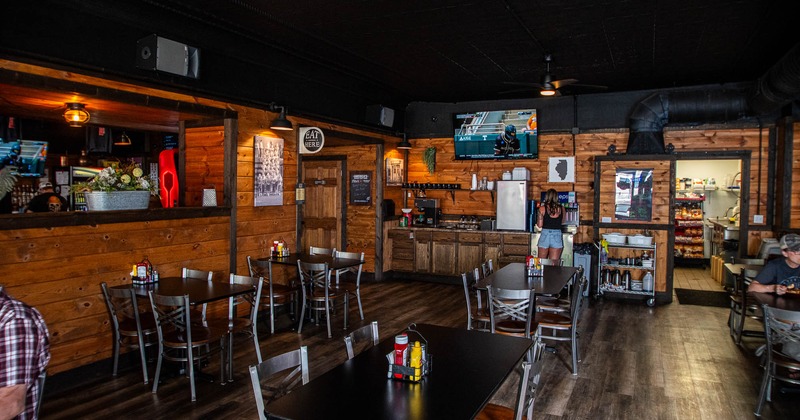 Interior, tables and chairs ready for guests