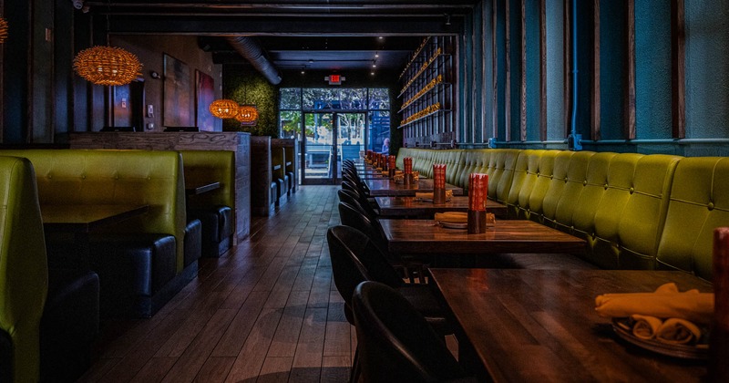 Interior, seating booths, tables and chairs lined up