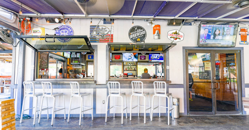 Exterior, covered patio, bar and food counter with seats