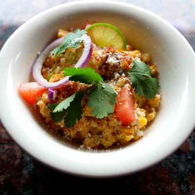 Ceviche with shrimp, tomato, onion, cilantro and lime.