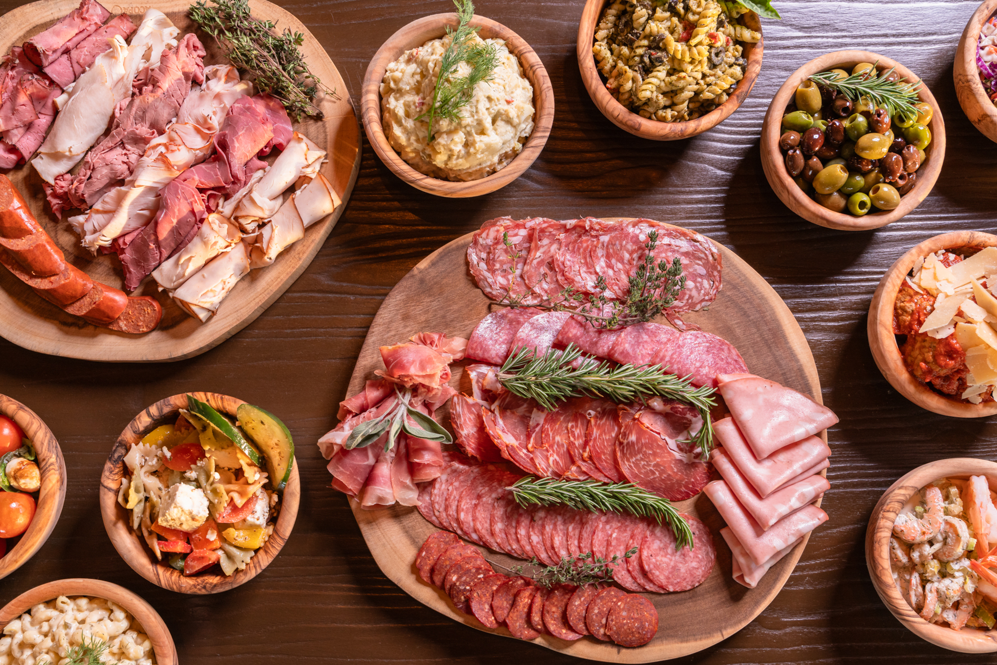 Deli meat boards and sides, top view