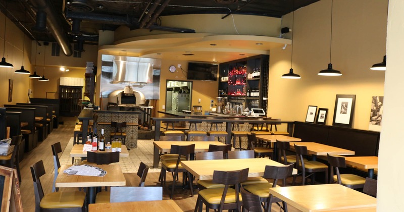 Restaurant interior, dining area, order counter, pizza oven