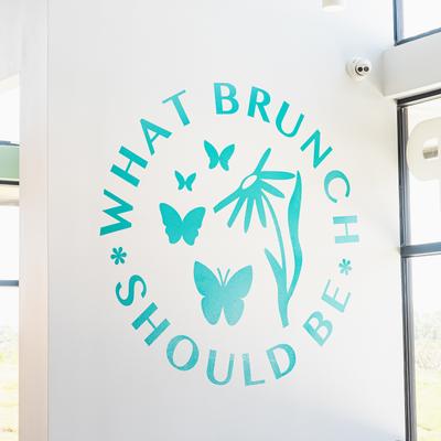 Interior, a teal colored logo reading 