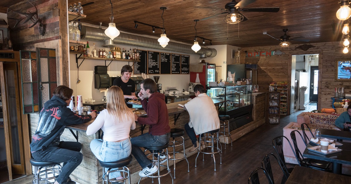 Guests having food and drinks at the bar