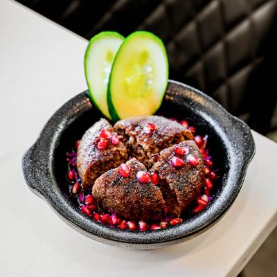 A portion of grilled kebbeh.