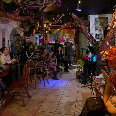 Lots of guests at tables.