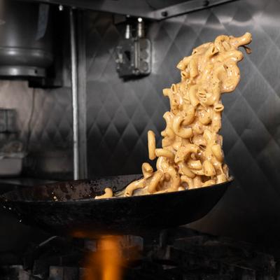Macaroni cooking in a pan.